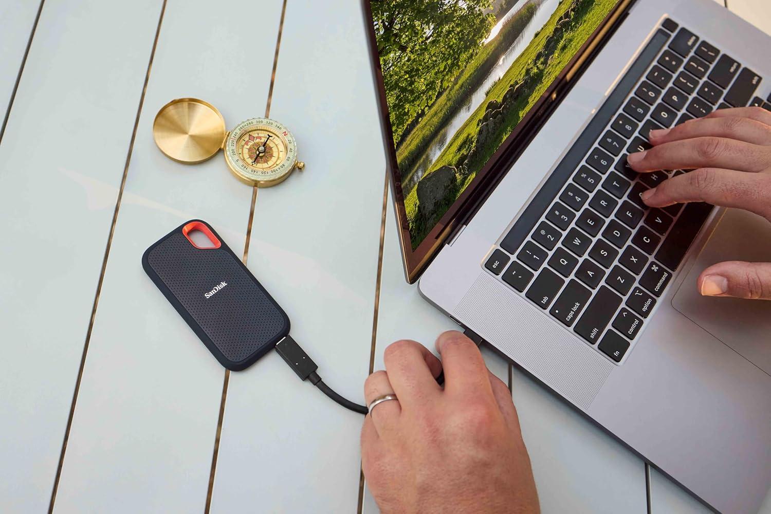 imageSanDisk 4TB Extreme Portable SSD  Up to 1050MBs USBC USB 32 Gen 2 IP65 Water and Dust Resistance Updated Firmware  External Solid State Drive  SDSSDE614T00G25Black